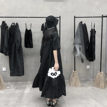 2021 suvel uus-line lihtne ja mugav lahti pikk seelik must keskmise pikkusega disain niši naiste kleit